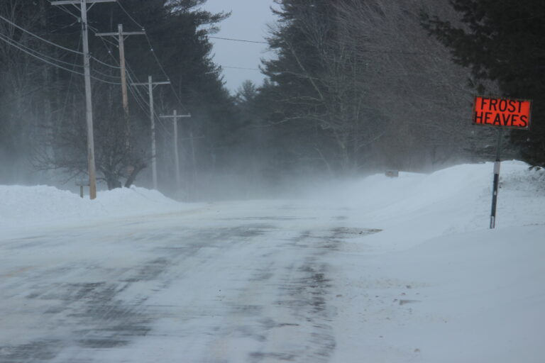 Frost Heaves snow covered road